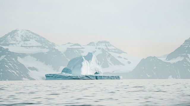 An iceberg floats in the Arctic. 
