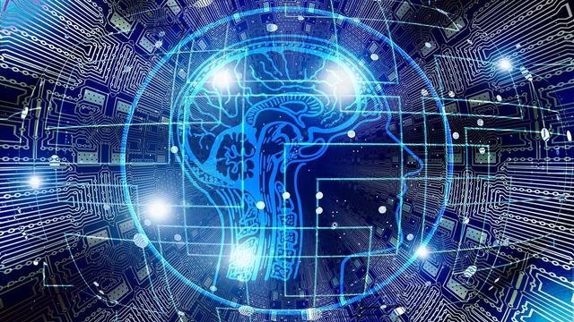 Artificial intelligence brain on computerized network background 
