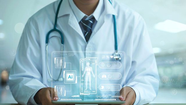 Medical professional holding an AI laptop to diagnose patient 